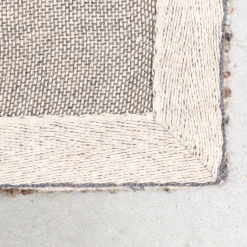 Beige vloerkleed van wol - Dutchbone Rhea