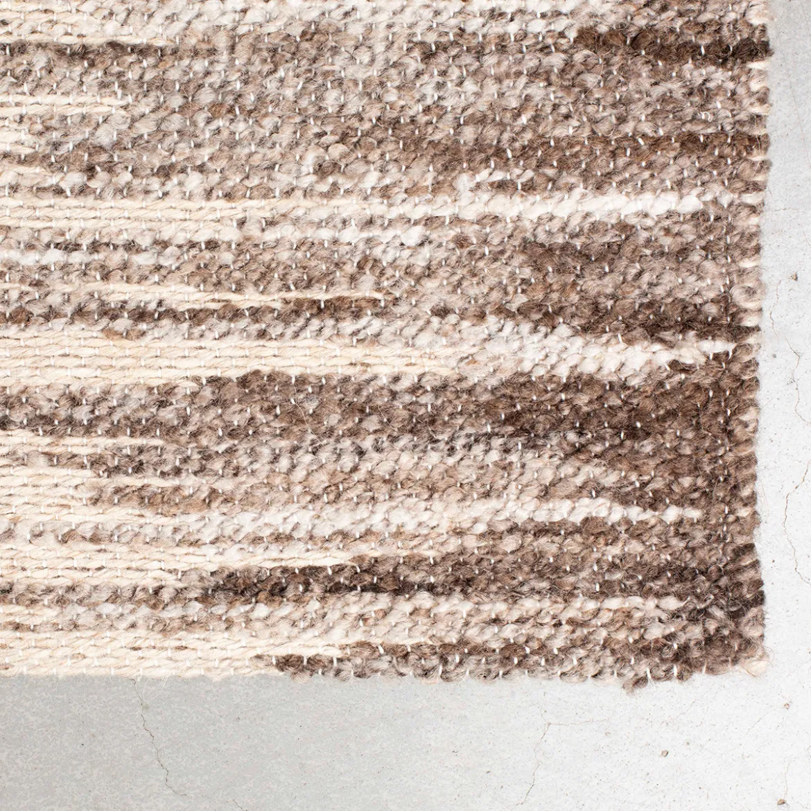 Beige vloerkleed van wol - Dutchbone Rhea